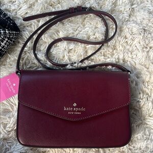 Kate Spade Sadie Envelope Crossbody deep berry